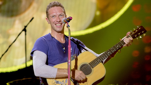 A alegria e a simpatia de Chris Martin, sempre mostrando interatividade com o público do Coldplay